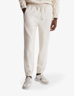 Reiss Bear Tapered-leg Mid-rise Stretch-knit Jogging Bottoms 7 Reiss Bear Tapered-leg Mid-rise Stretch-knit Jogging Bottoms -Fit & Flow Clothing Sales Store R04068124 IVORY ALT02