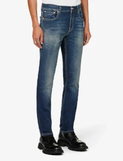 Alexander McQueen Graffiti Brand-embroidered Tapered-leg Regular-fit Stretch-denim Jeans -Fit & Flow Clothing Sales Store R04153535 BLUEWASHED ALT02