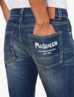 Alexander McQueen Graffiti Brand-embroidered Tapered-leg Regular-fit Stretch-denim Jeans -Fit & Flow Clothing Sales Store R04153535 BLUEWASHED ALT04