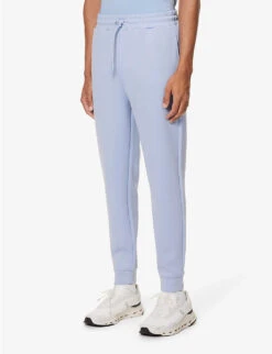 CASTORE Logo-print Tapered-leg Stretch-woven Jogging Bottoms -Fit & Flow Clothing Sales Store R04170790 SKY ALT02